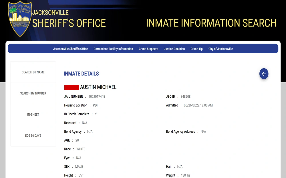 A screenshot of a law enforcement website, showing a search interface for detainee details, with specific information provided such as name, identification numbers, housing location, admission date, and personal attributes.